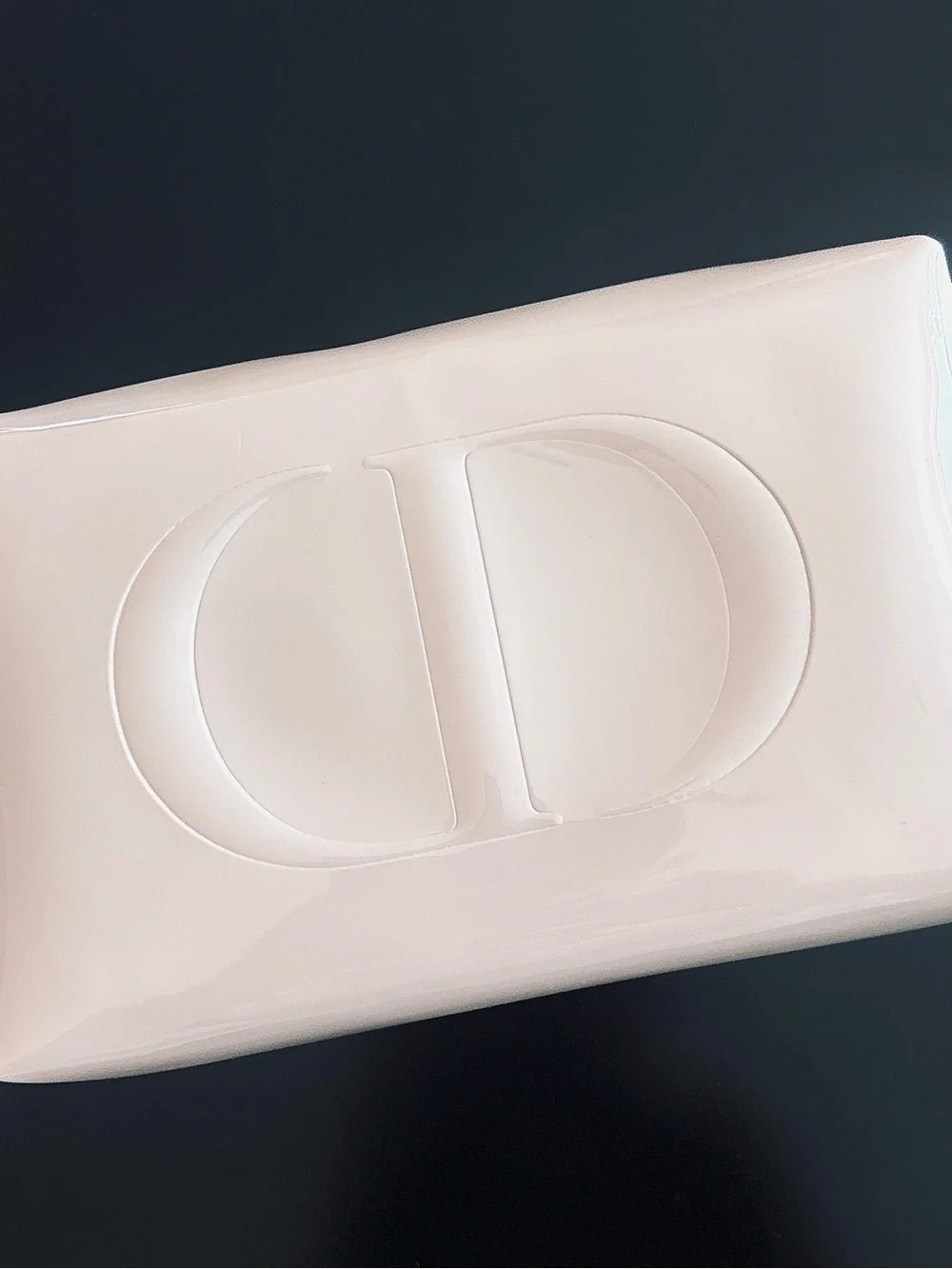 Dior beauty light pink glossy cosmetic bag with embossed CD logo